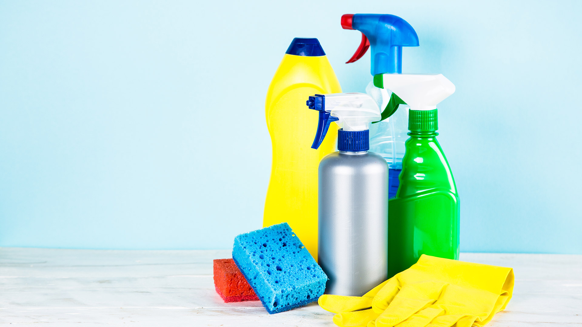 cleaning products on blue background